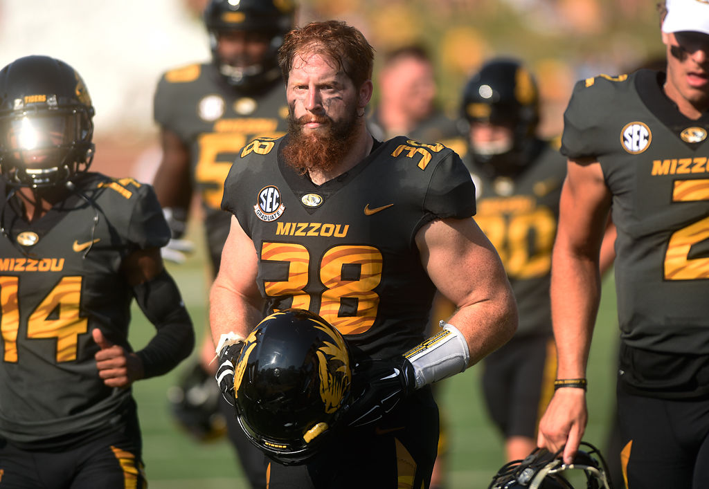 Missouri linebacker Eric Beisel leaves the field at halftime